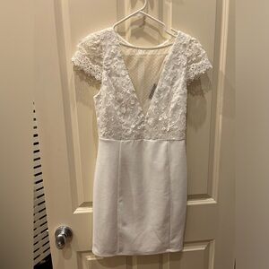White mini dress with mesh inlay
